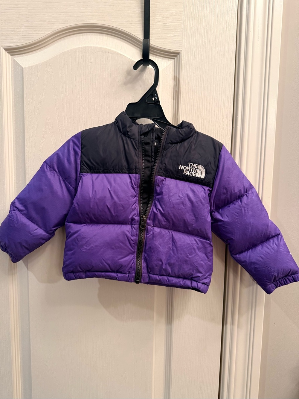 The North Face Kids Purple and Black down Puffer Jacket. 700 series